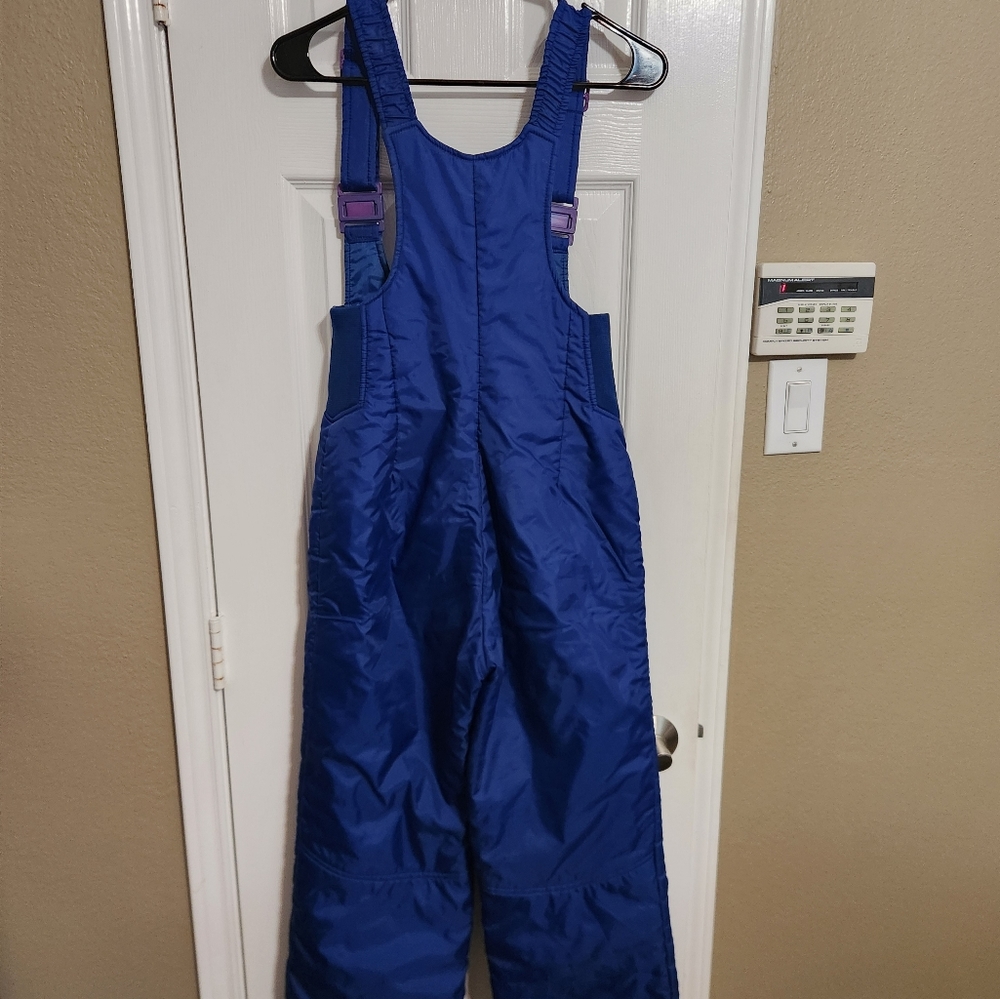 Ossi skiwear pants , size women's small and color blue